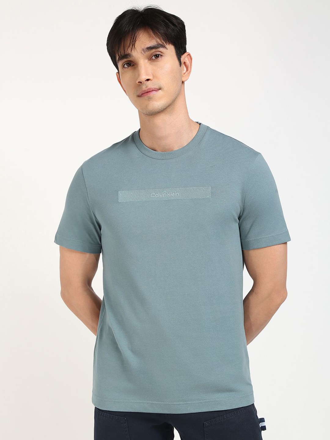 

Calvin Klein Jeans Men Solid Round Neck Cotton T-shirt, Blue