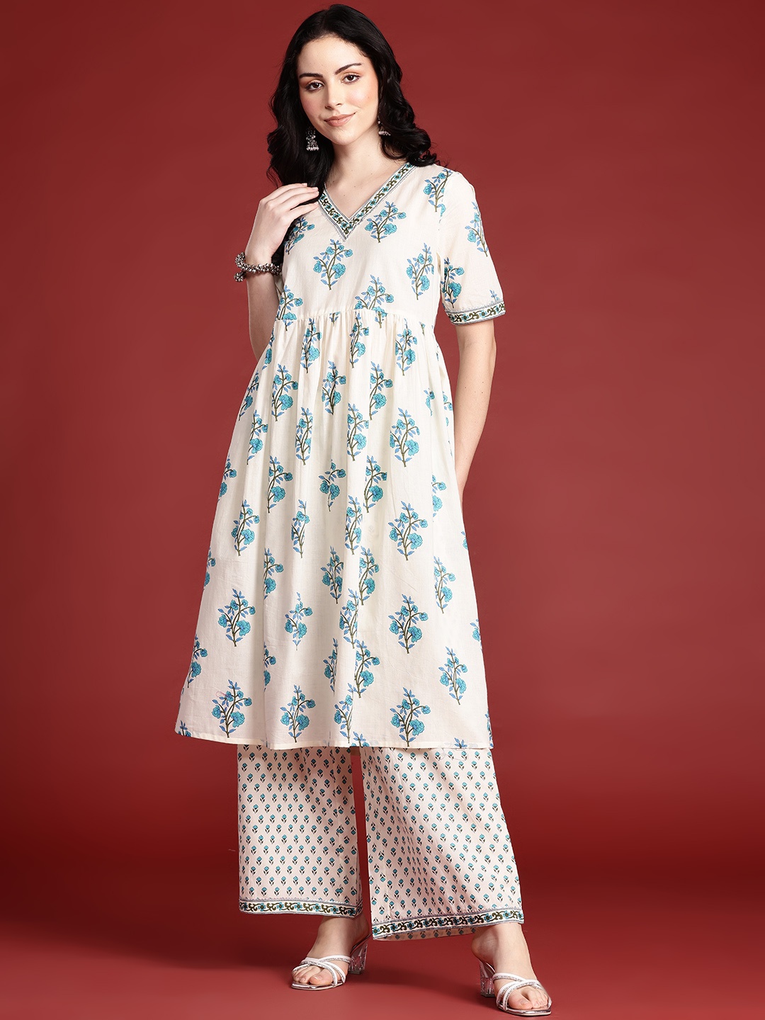 

Anouk Ethnic Motifs Printed Empire Gotta Patti Cotton Kurta Set, Off white