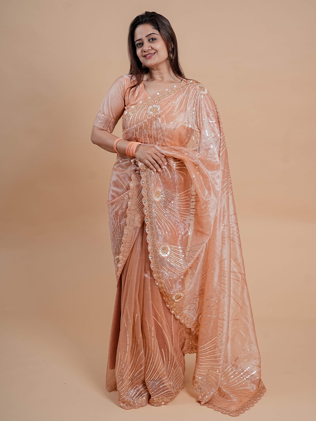 

Chandbaali Embellished Sequinned Net Saree, Peach