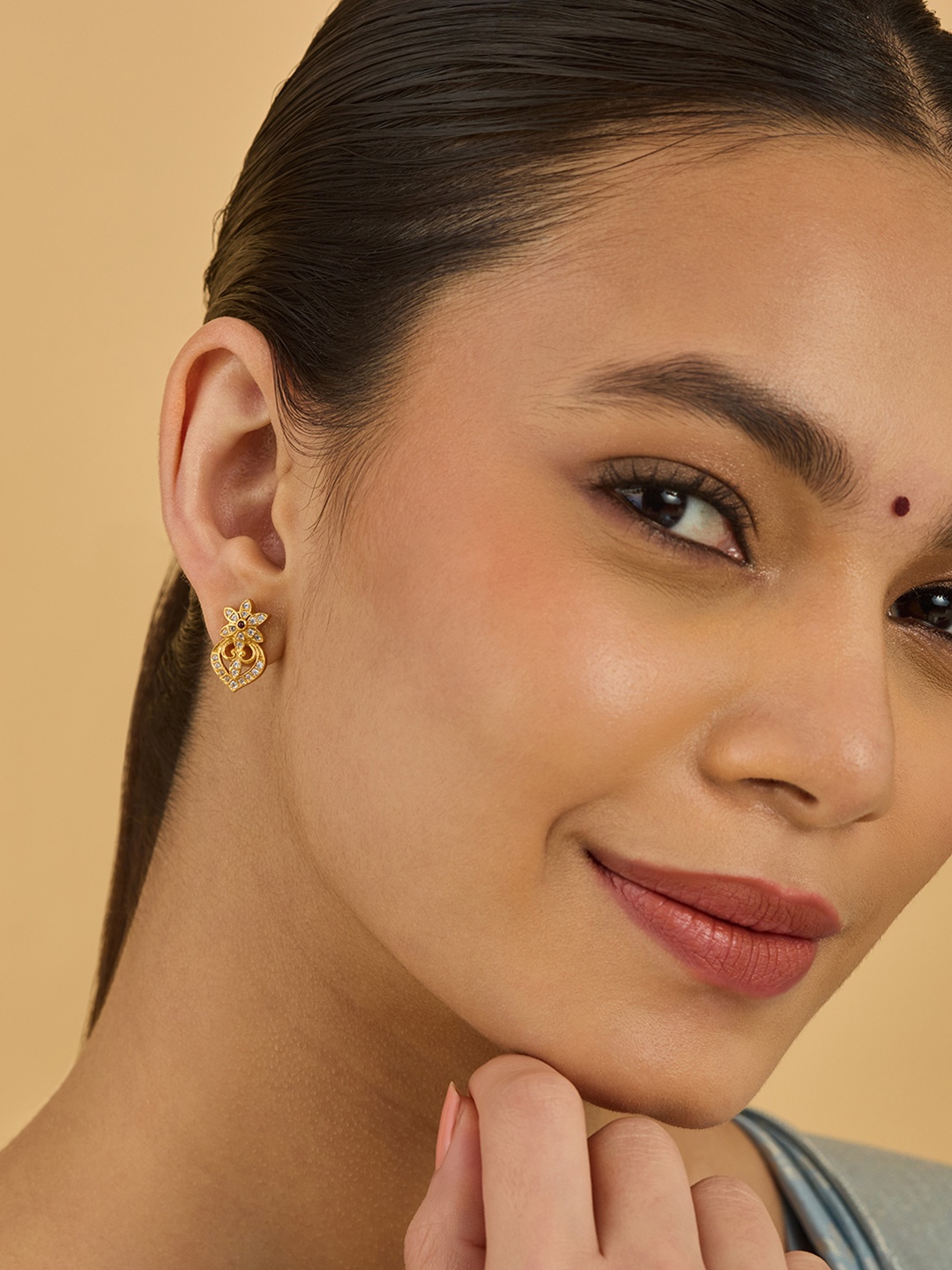 

Kushal's Fashion Jewellery 92.5 Sterling Silver Gold-Plated Temple Contemporary Studs
