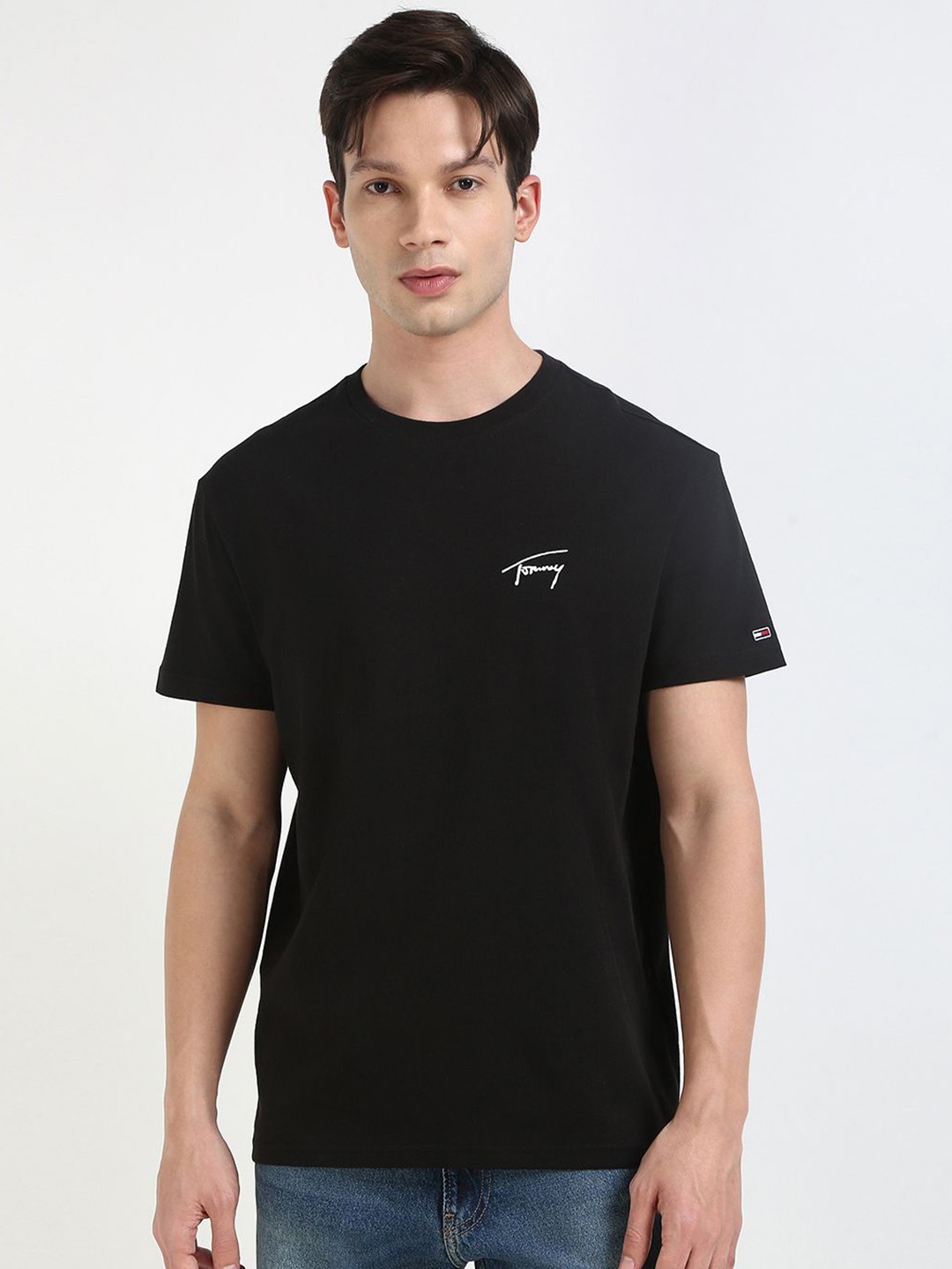 

Tommy Hilfiger Men Solid Round Neck Cotton T-shirt, Black