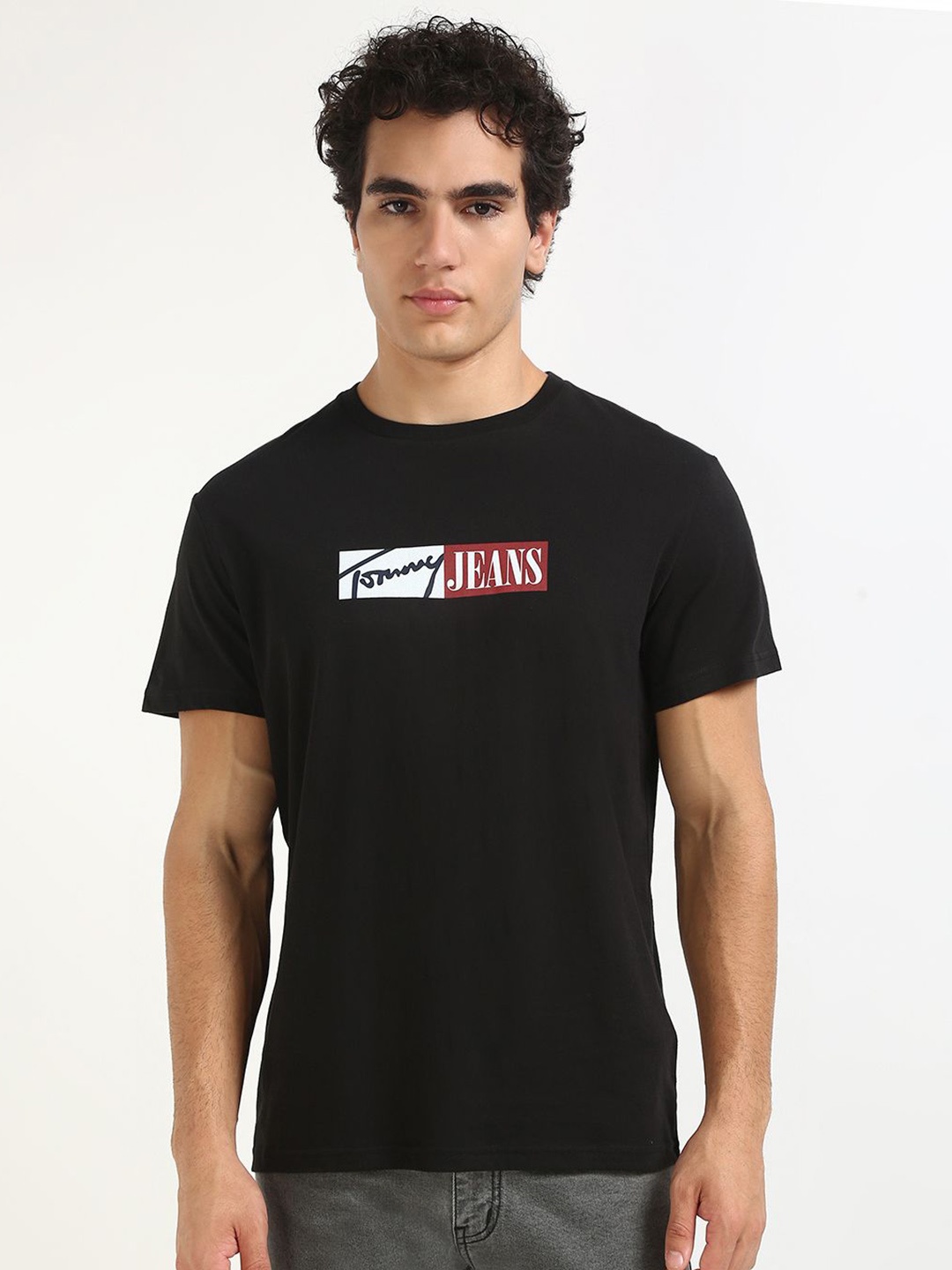 

Tommy Hilfiger Men Typography Printed Round Neck Cotton T-shirt, Black