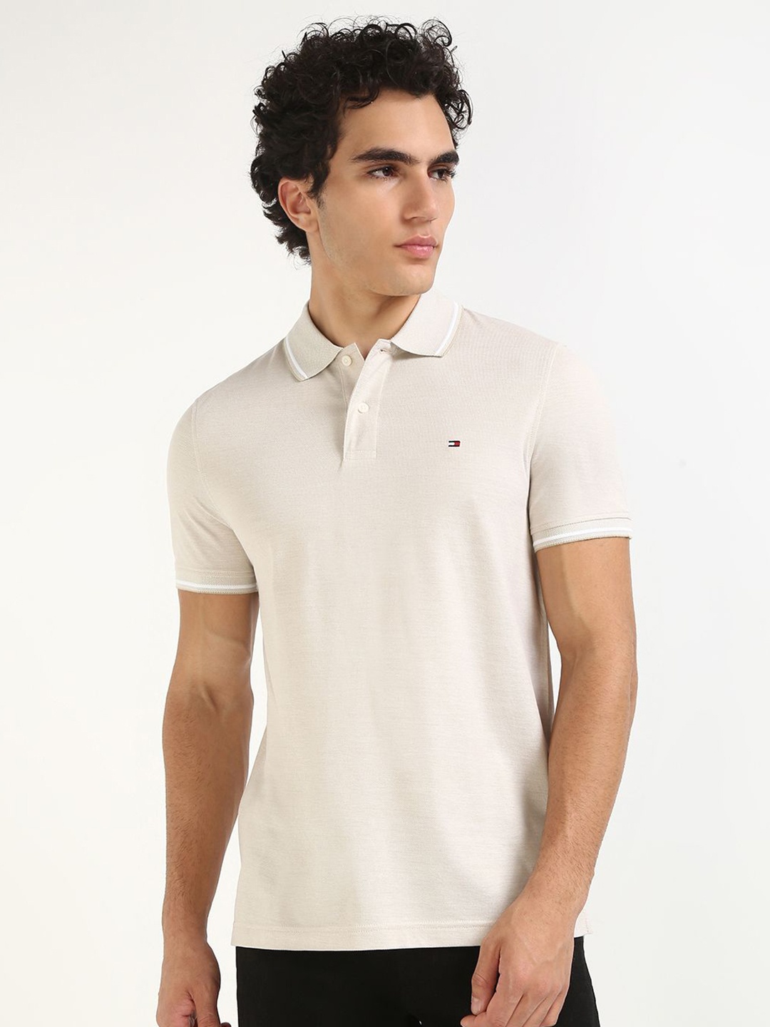 

Tommy Hilfiger Men Solid Polo Collar Cotton T-shirt, White