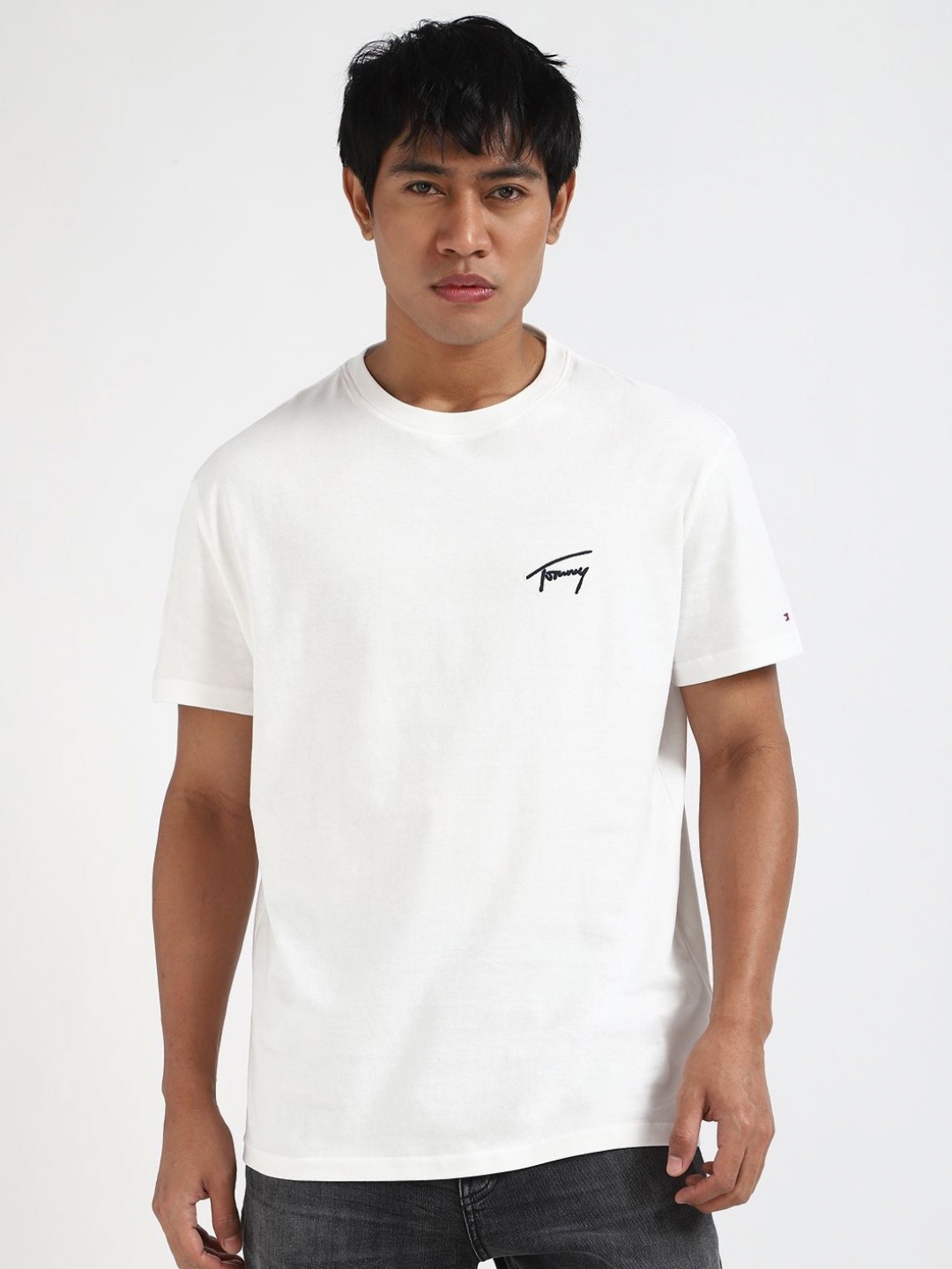 

Tommy Hilfiger Men Solid Round Neck Cotton T-shirt, White