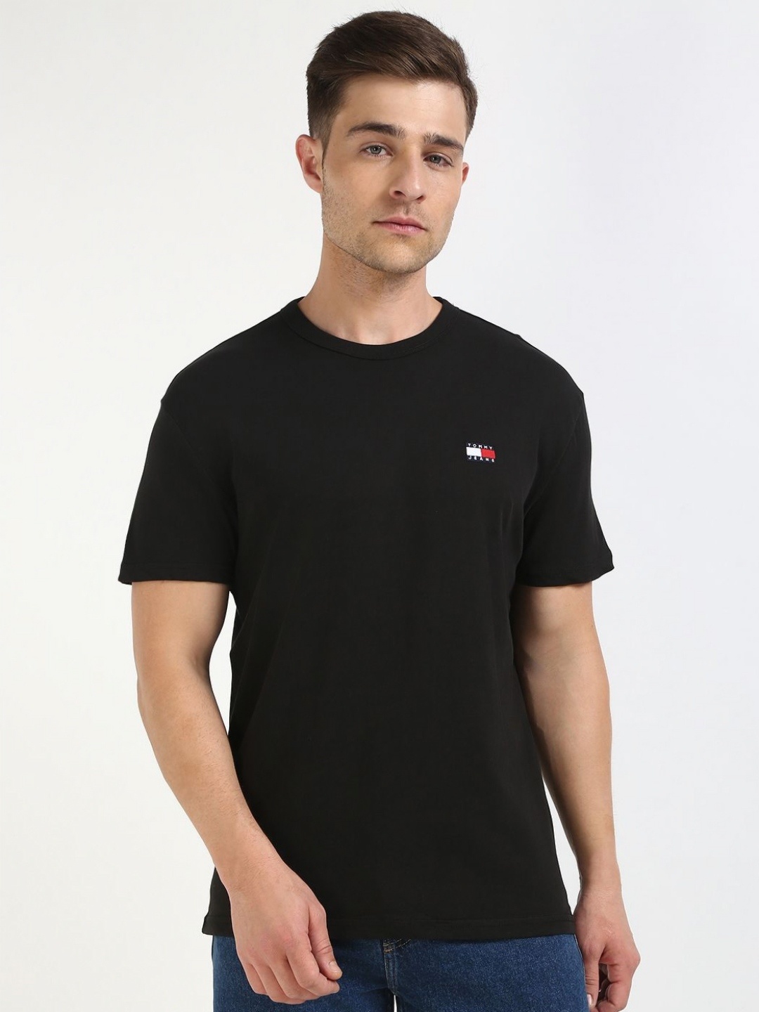 

Tommy Hilfiger Men Solid Round Neck Cotton T-shirt, Black
