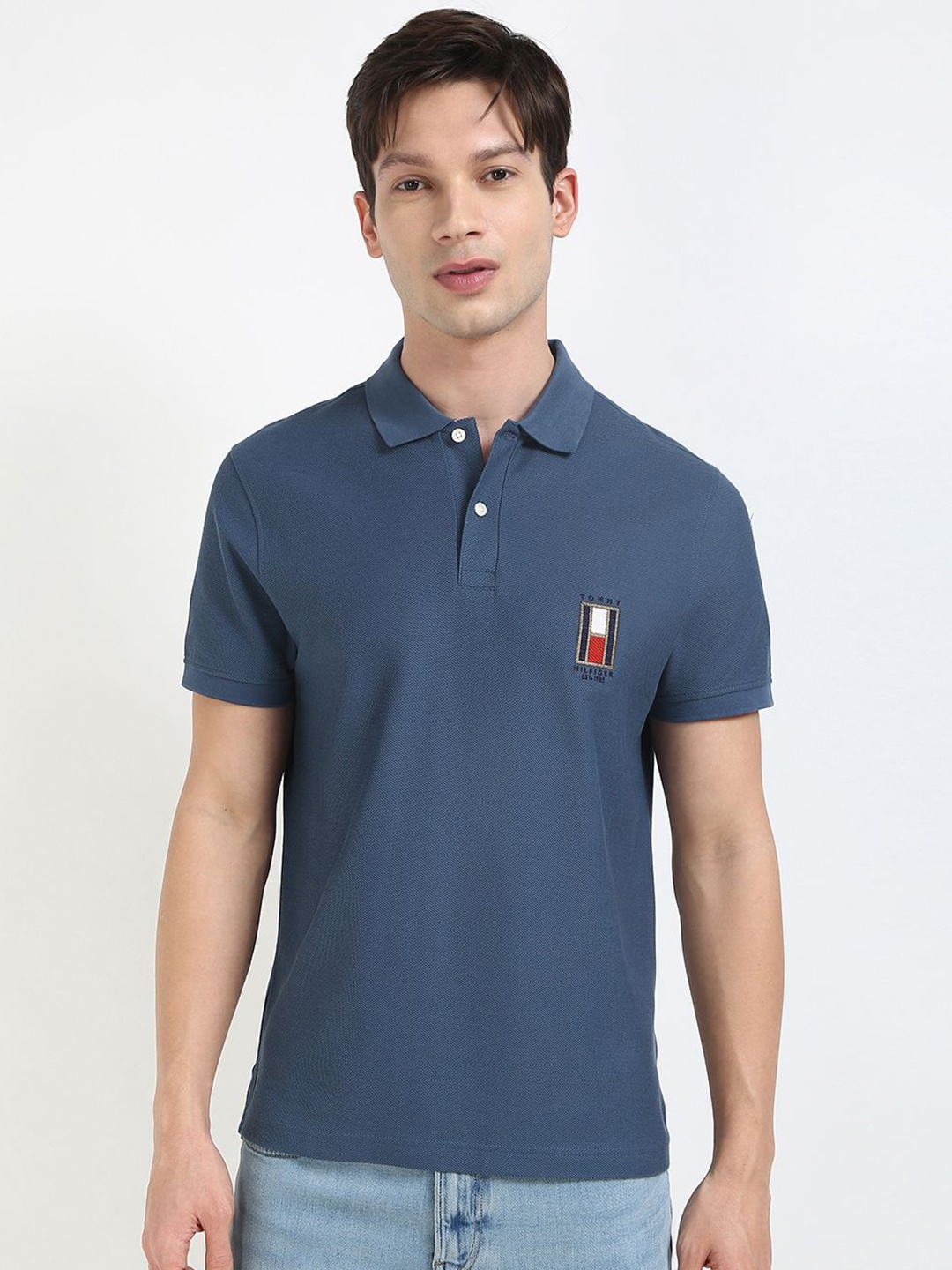 

Tommy Hilfiger Men Solid Polo Collar Cotton T-shirt, Blue