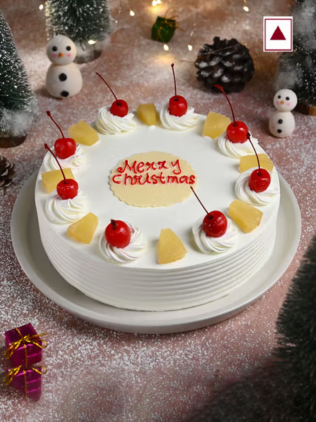 

Floweraura Fresh Yummy Merry Christmas Pineapple Flavour Round Shape Cake- 1Kg, White