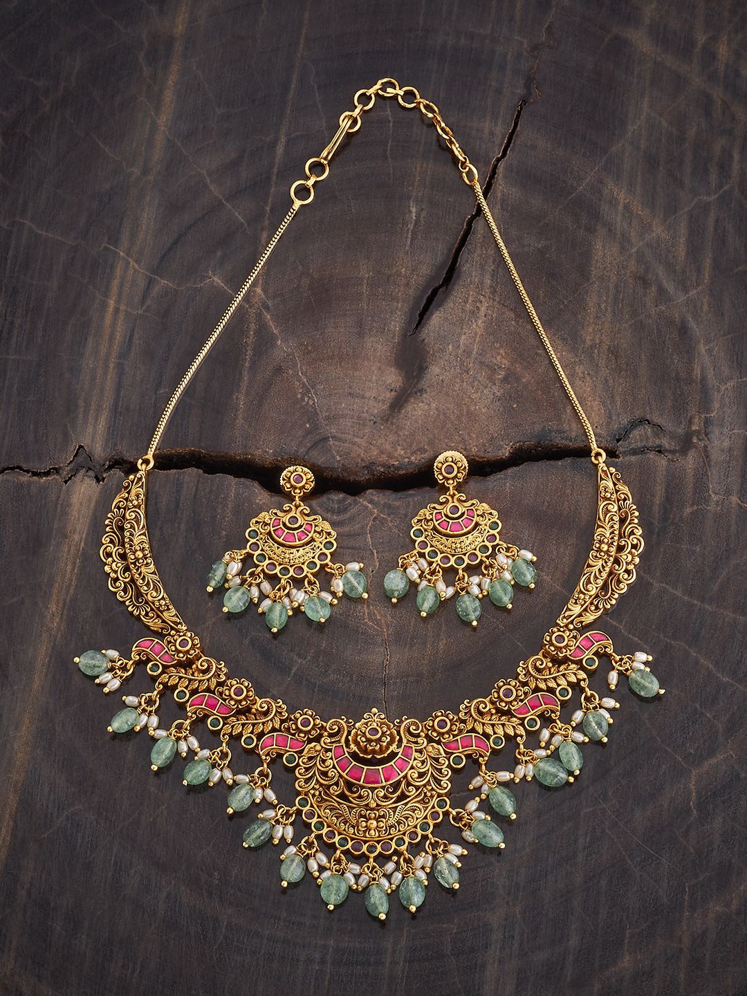 

Kushal's Fashion Jewellery Gold-Plated Ruby Studded & Beaded Antique Jewellery Set