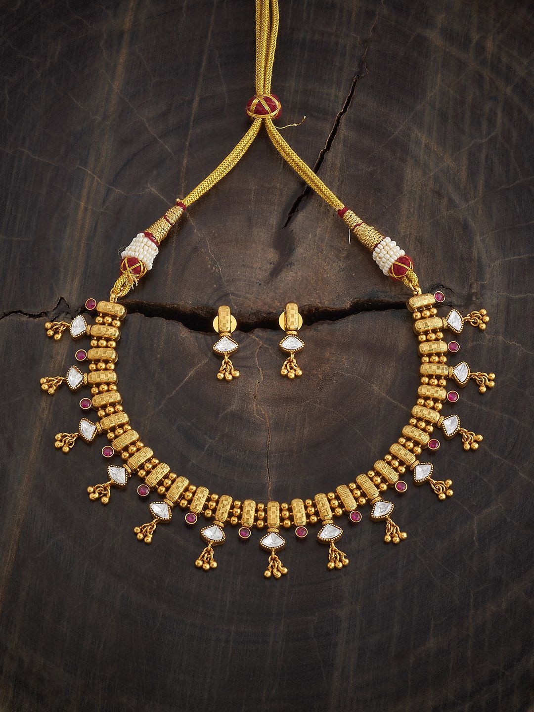 

Kushal's Fashion Jewellery Gold-Plated Ruby Stone Studded Antique Jewellery Set