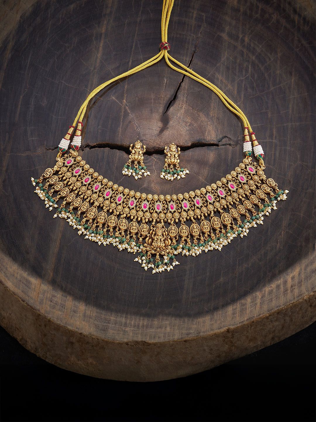 

Kushal's Fashion Jewellery Gold-Plated Ruby Stone Studded & Beaded Antique Jewellery Set
