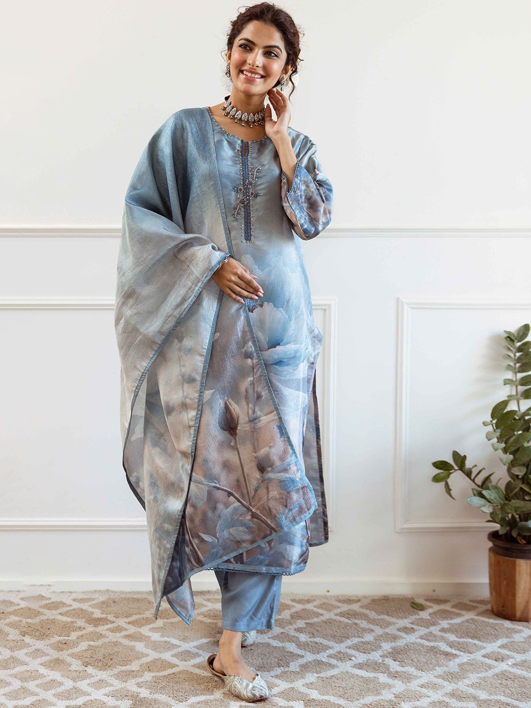 

Nehamta Floral Printed Sequinned Tissue Silk Straight Kurta with Trousers & Dupatta, Turquoise blue