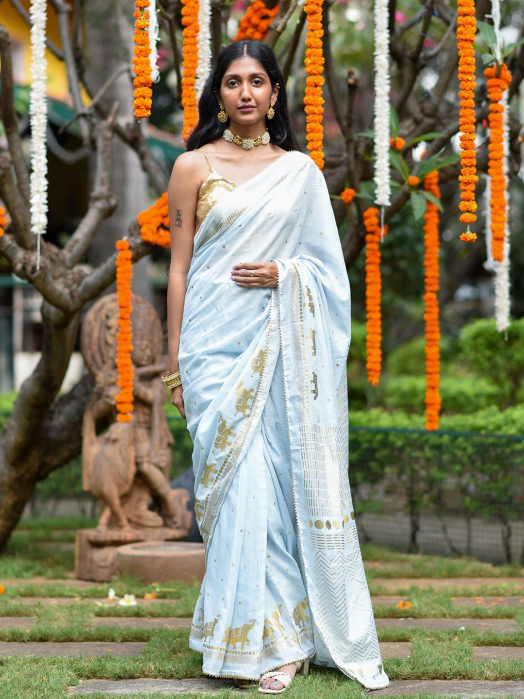 

Suta Blue & Gold-Toned Polka Dot Printed Ready To Wear Saree.