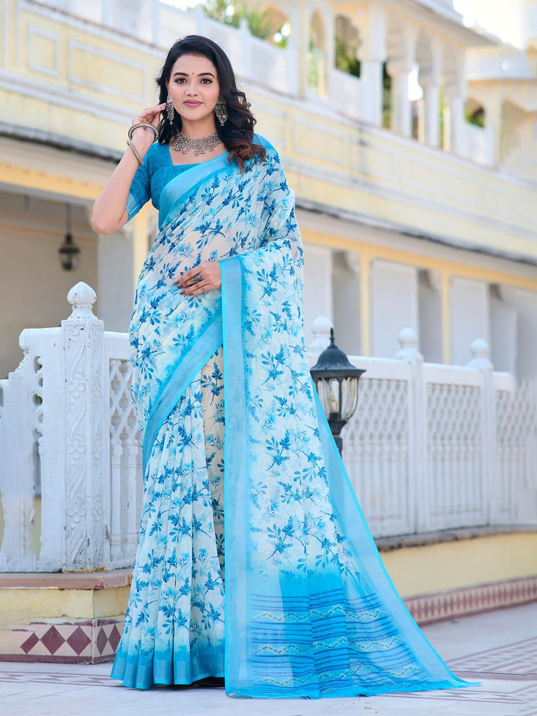 

Celeb Styles Floral Zari Saree, Turquoise blue