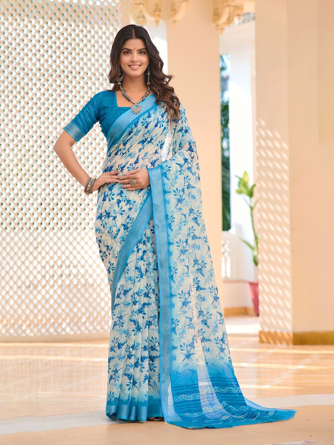 

Celeb Styles Floral Printed Zari Saree, Turquoise blue