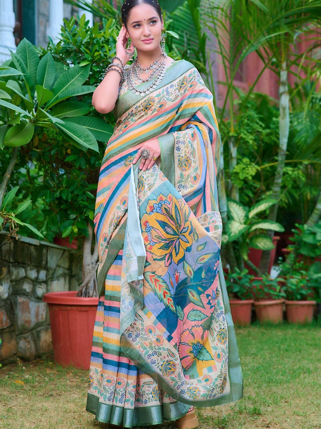 

Celeb Styles Striped Printed Zari Designer Saree, Green