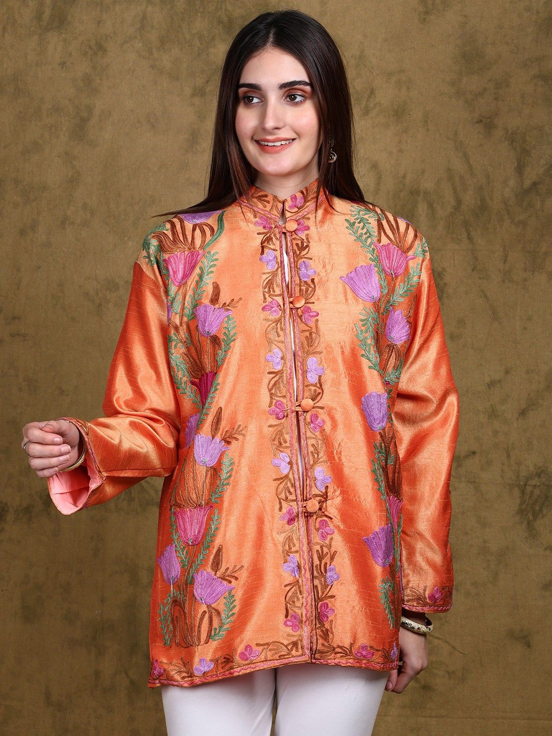 

Exotic India Orange Ochre Kashmiri Short Jacket with Aari Embroidered Tulip Flower