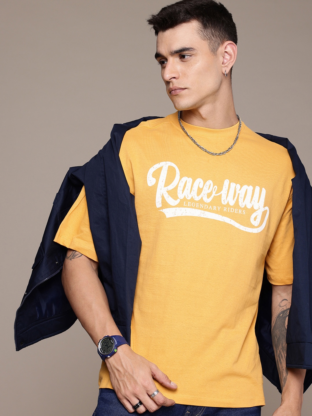 

The Roadster Life Co. Typography Printed Drop-Shoulder Sleeves Pure Cotton T-shirt, Mustard