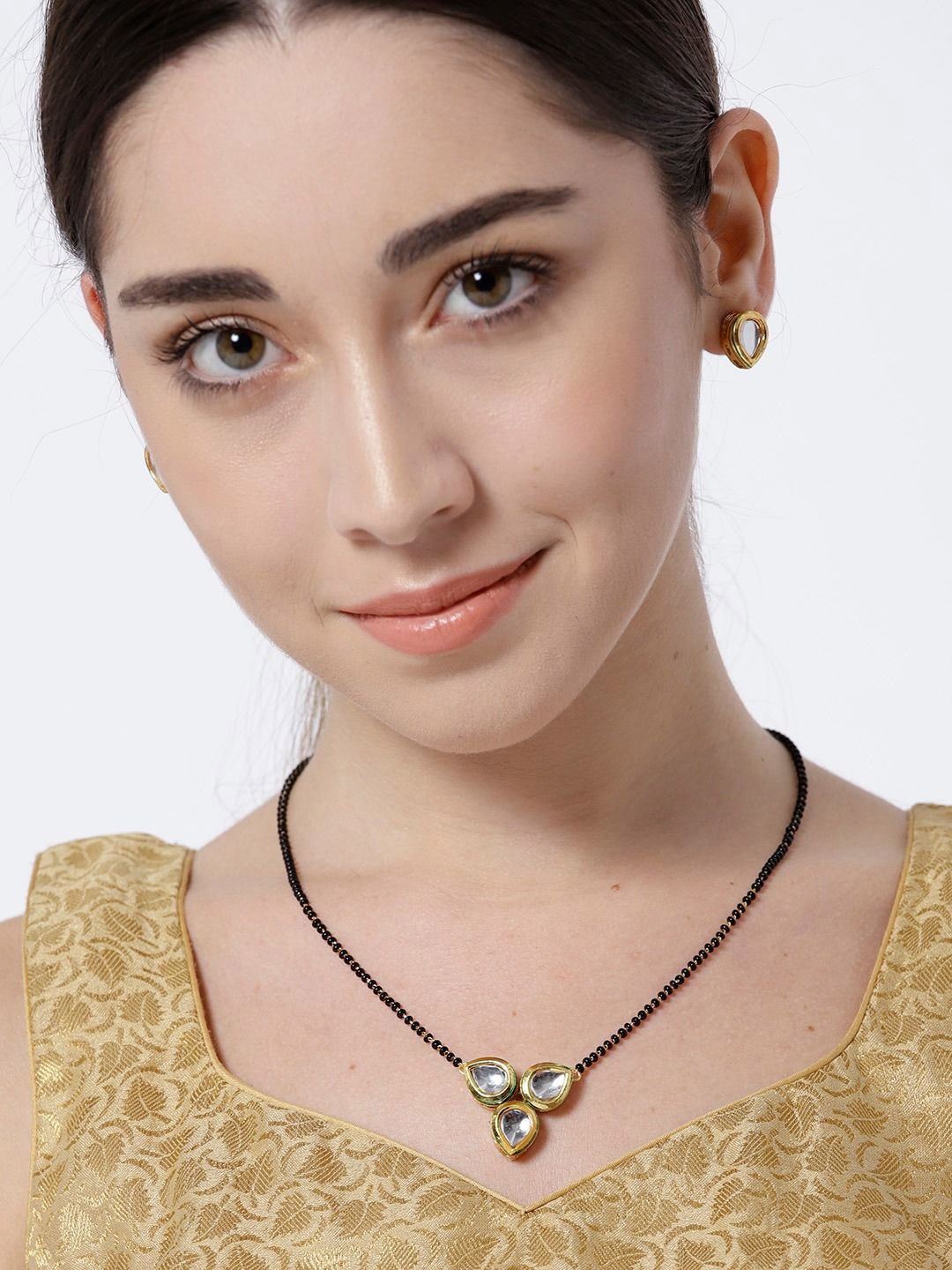 

DIVASTRI Gold-Plated Artificial Stones and Beads Mangalsutra
