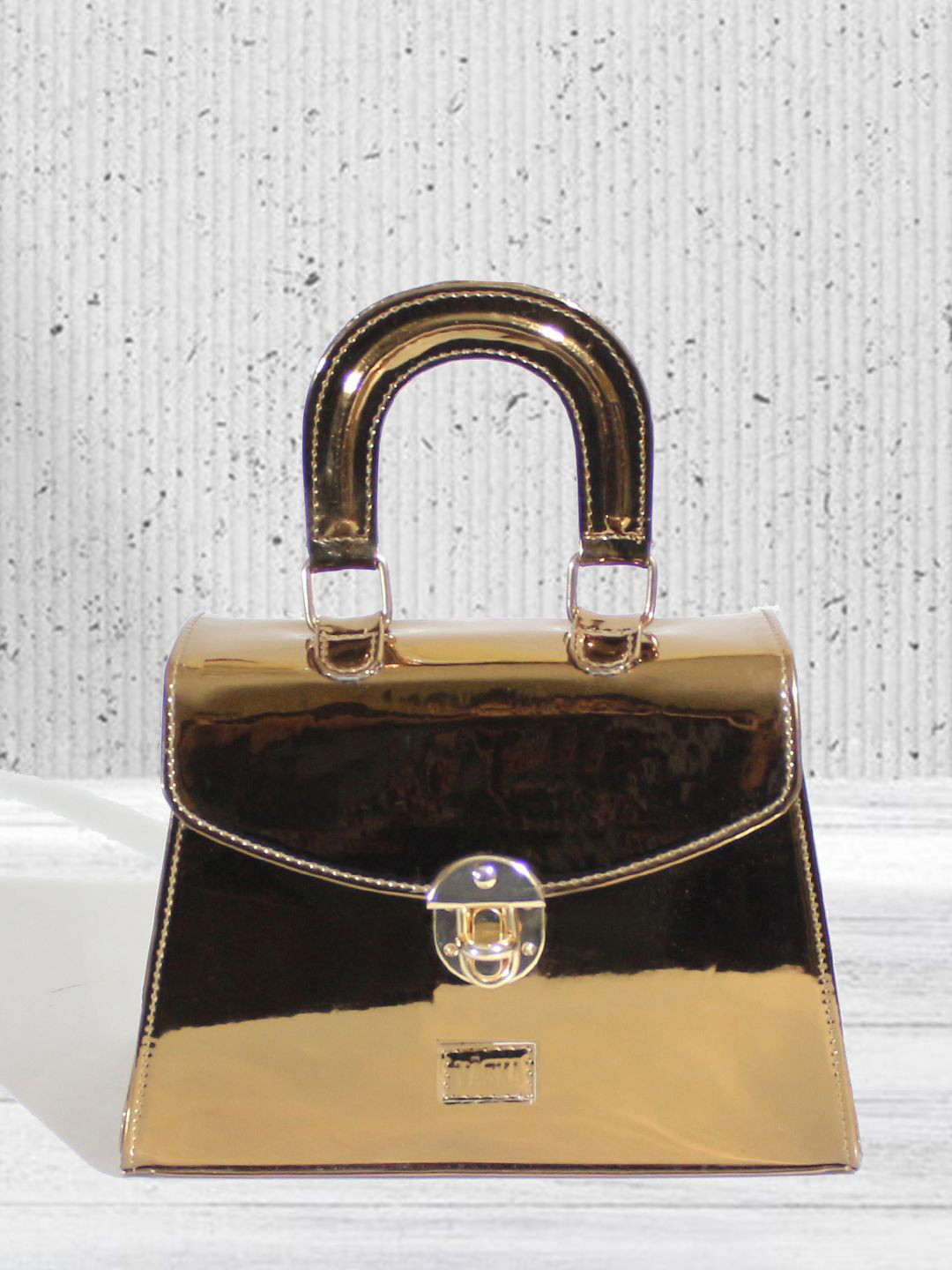 

VASKA Structured Handheld Bag with Cut Work, Copper