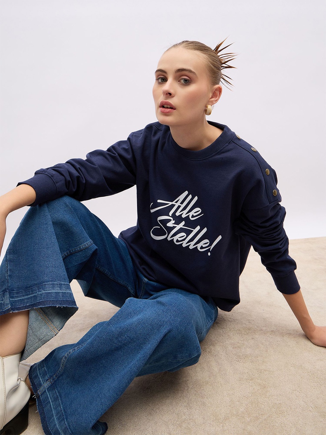 

Styli Women Oversize Fit Regular Length Slogan Shoulder Button Sweatshirt, Navy blue