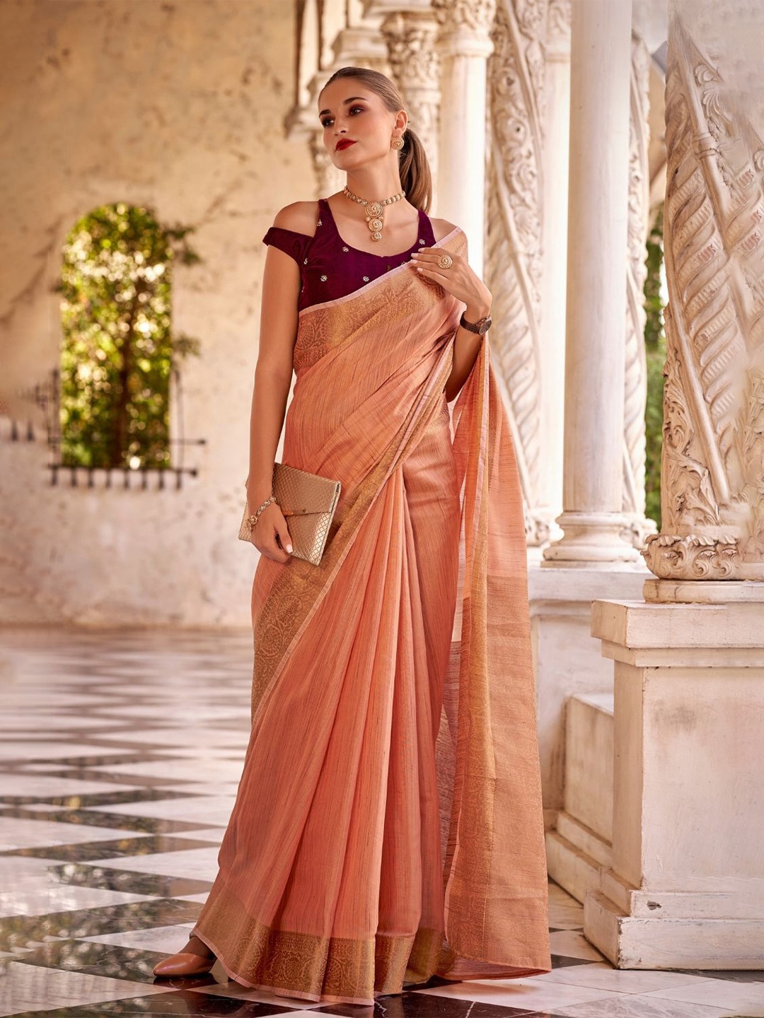 

DEVATITHI Orange Tissue Linen With Zari Weaving Saree