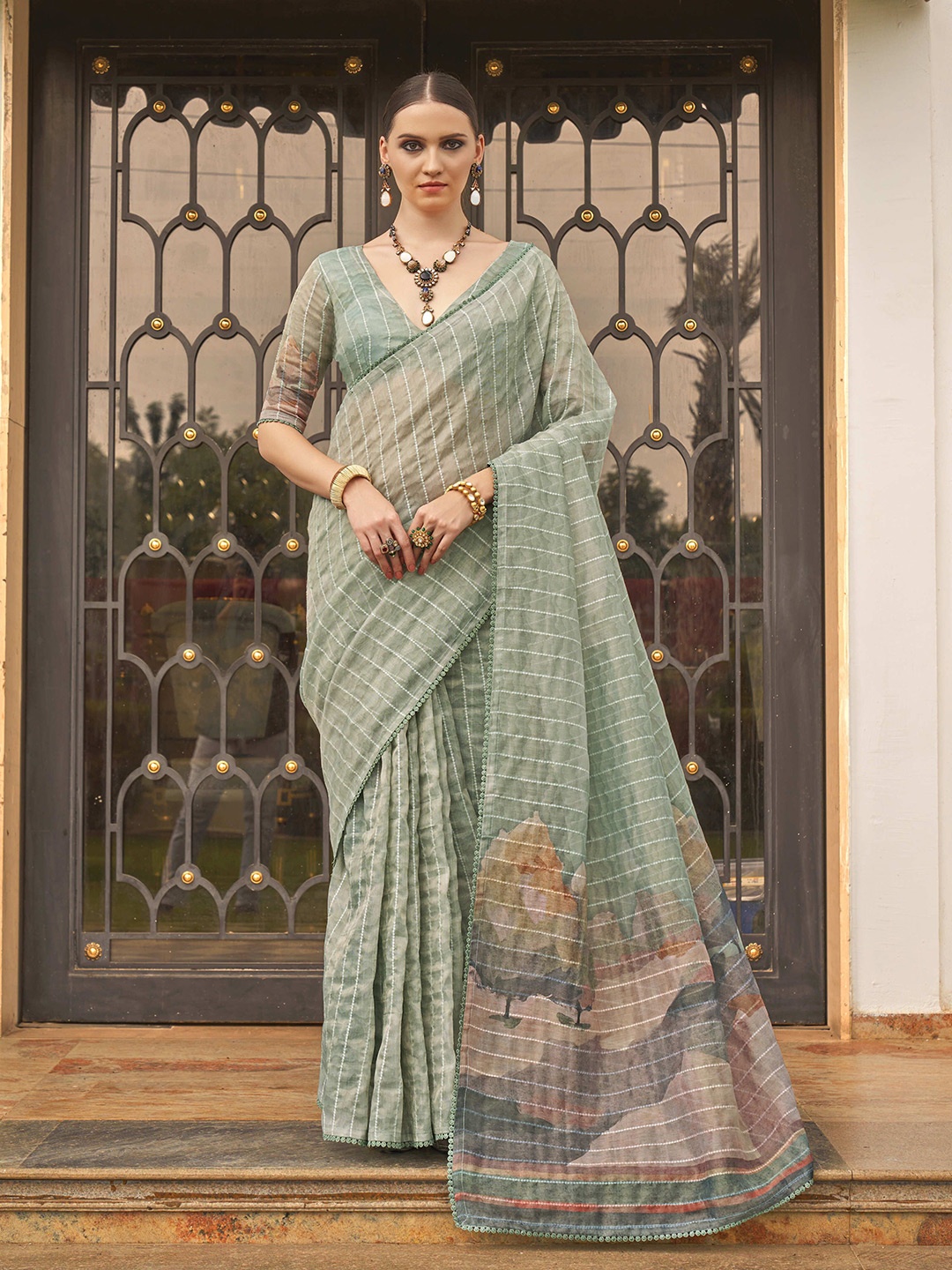 

DEVATITHI Striped Embroidered Pure Tissue Silk Saree, Green