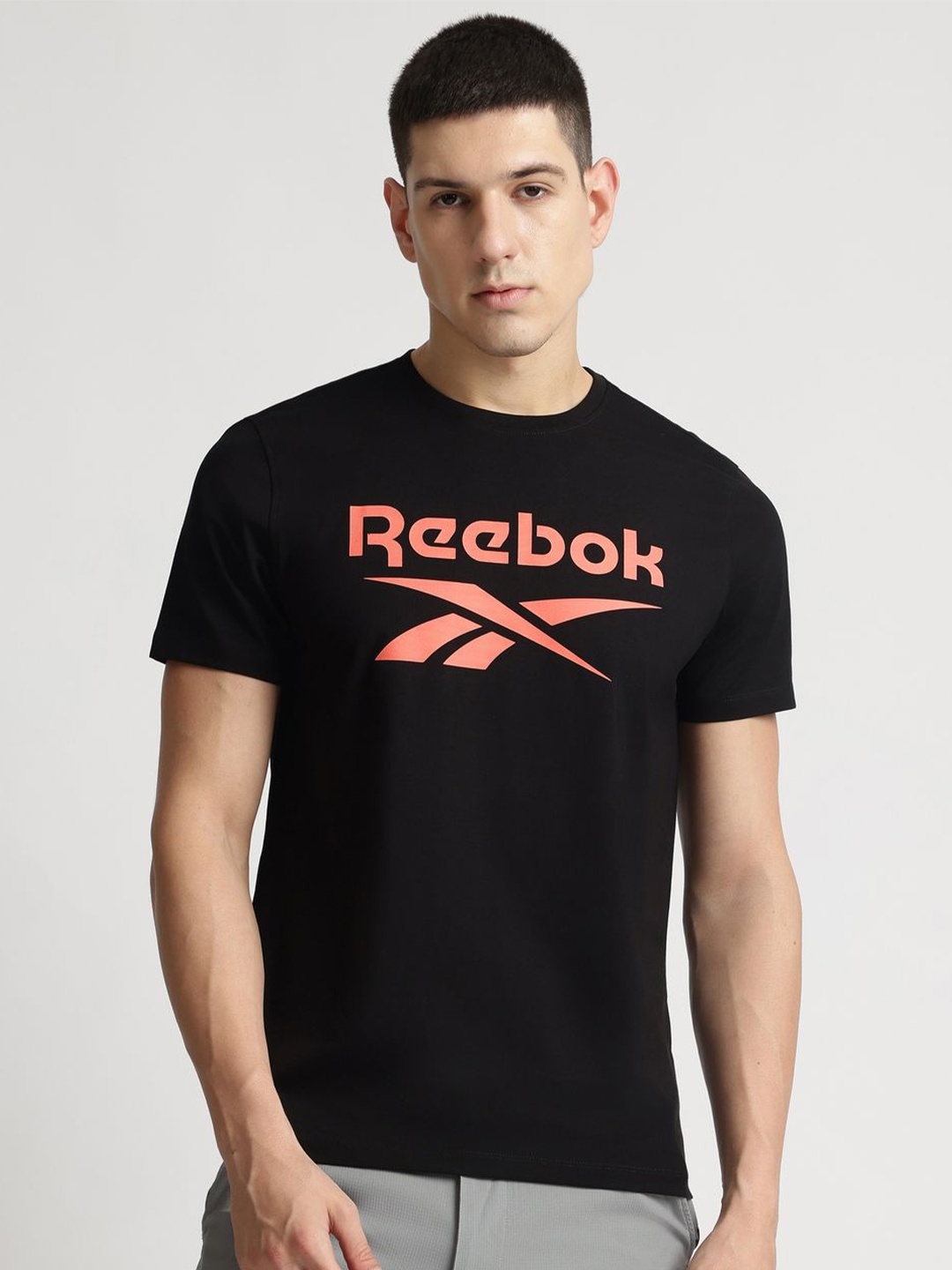 

Reebok Men Typographic Printed Round Neck Casual T-Shirt, Black