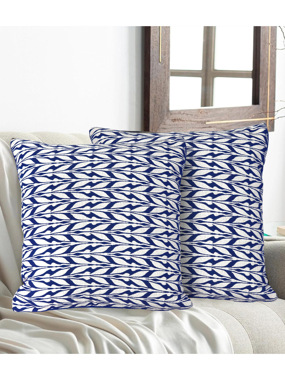 

Myntra Elegant Homes Blue & White Set of 5 Ethnic Motifs Velvet Square Cushion Covers