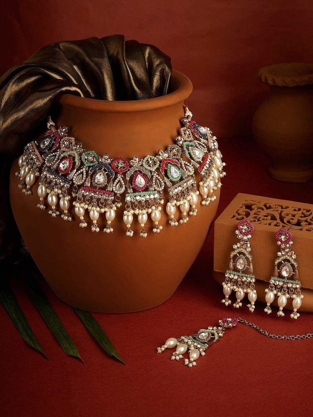 

Zaveri Pearls Gold Plated Stones Studded & Beaded Jewellery Set