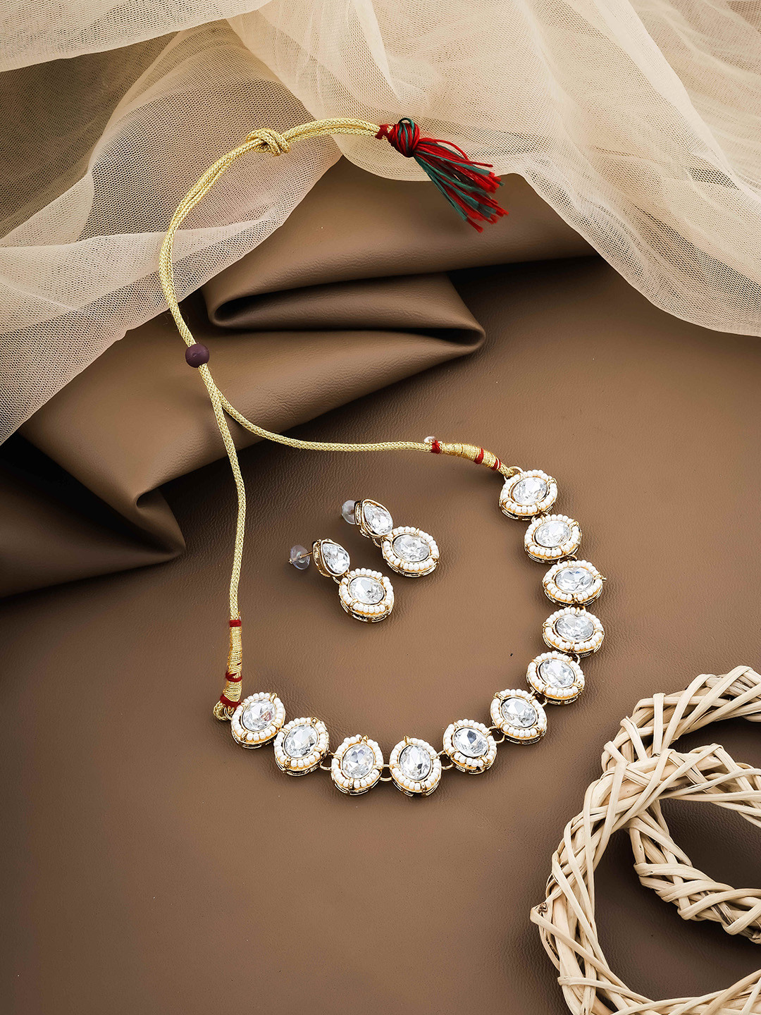 

Wynona Gold-Plated Kundan Stones-Studded & Pearls-Beaded Jewellery Set