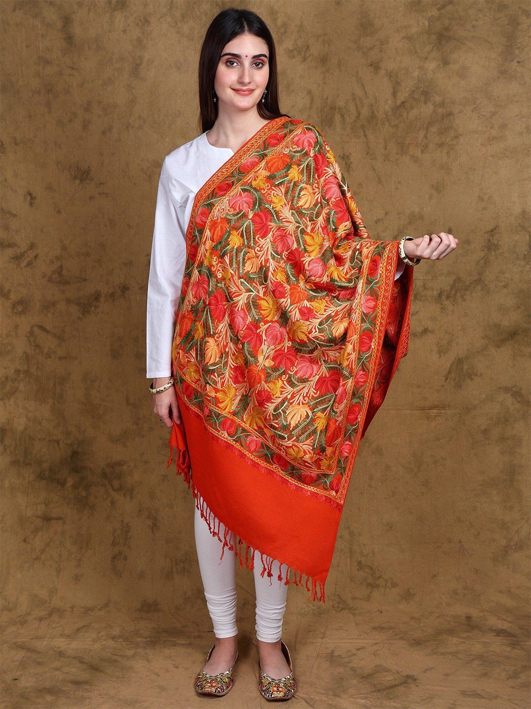 

Exotic India Spicy Orange Wool Jamawar Embroidered Kashmiri Stole with Floral Motifs