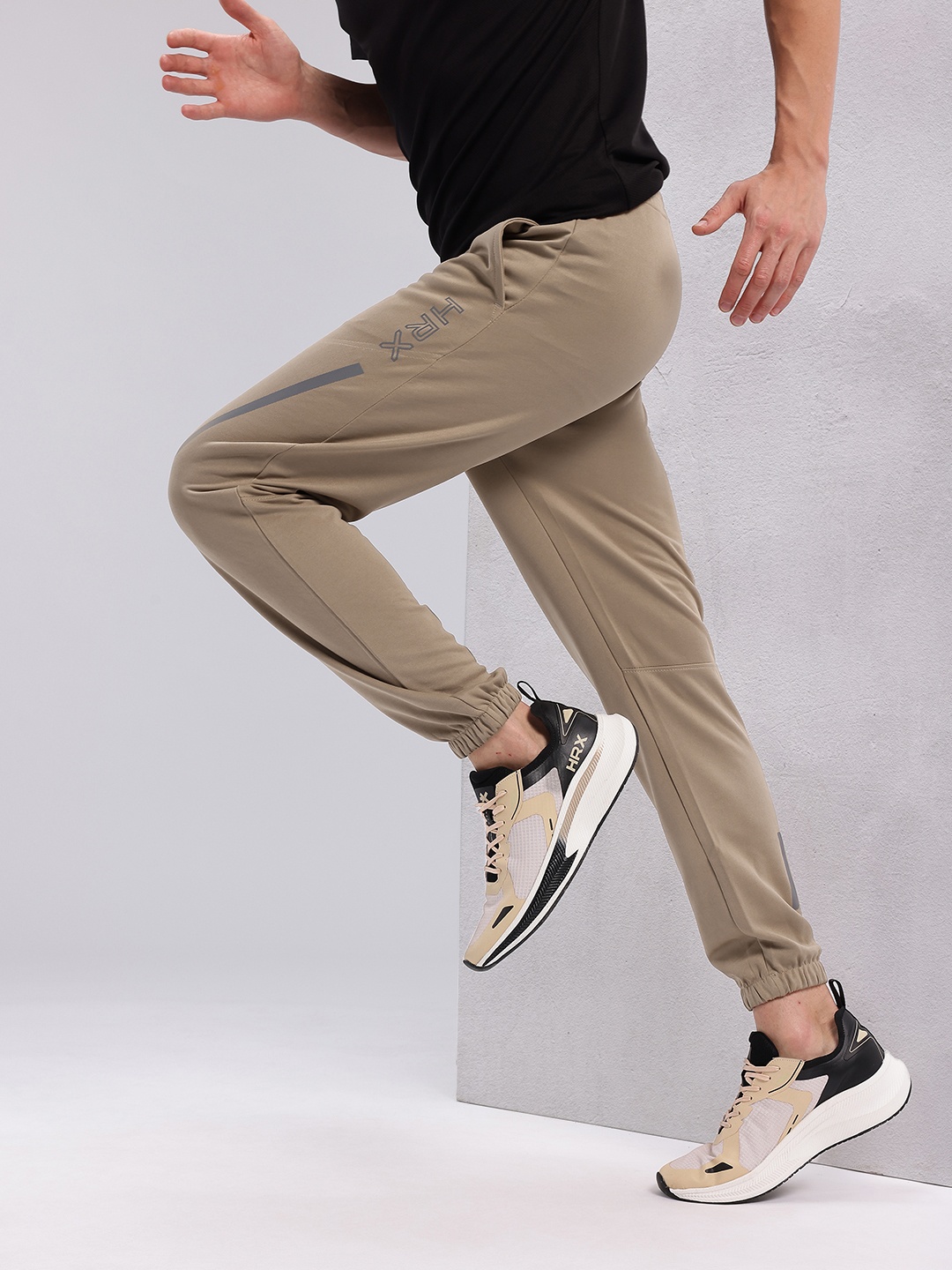 

HRX by Hrithik Roshan Men Reflective Detail Rapid-Dry Running Track Pants, Beige