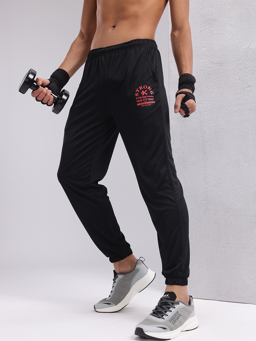 

HRX by Hrithik Roshan Men Mid-Rise Typography Print Rapid-Dry Training Joggers, Black