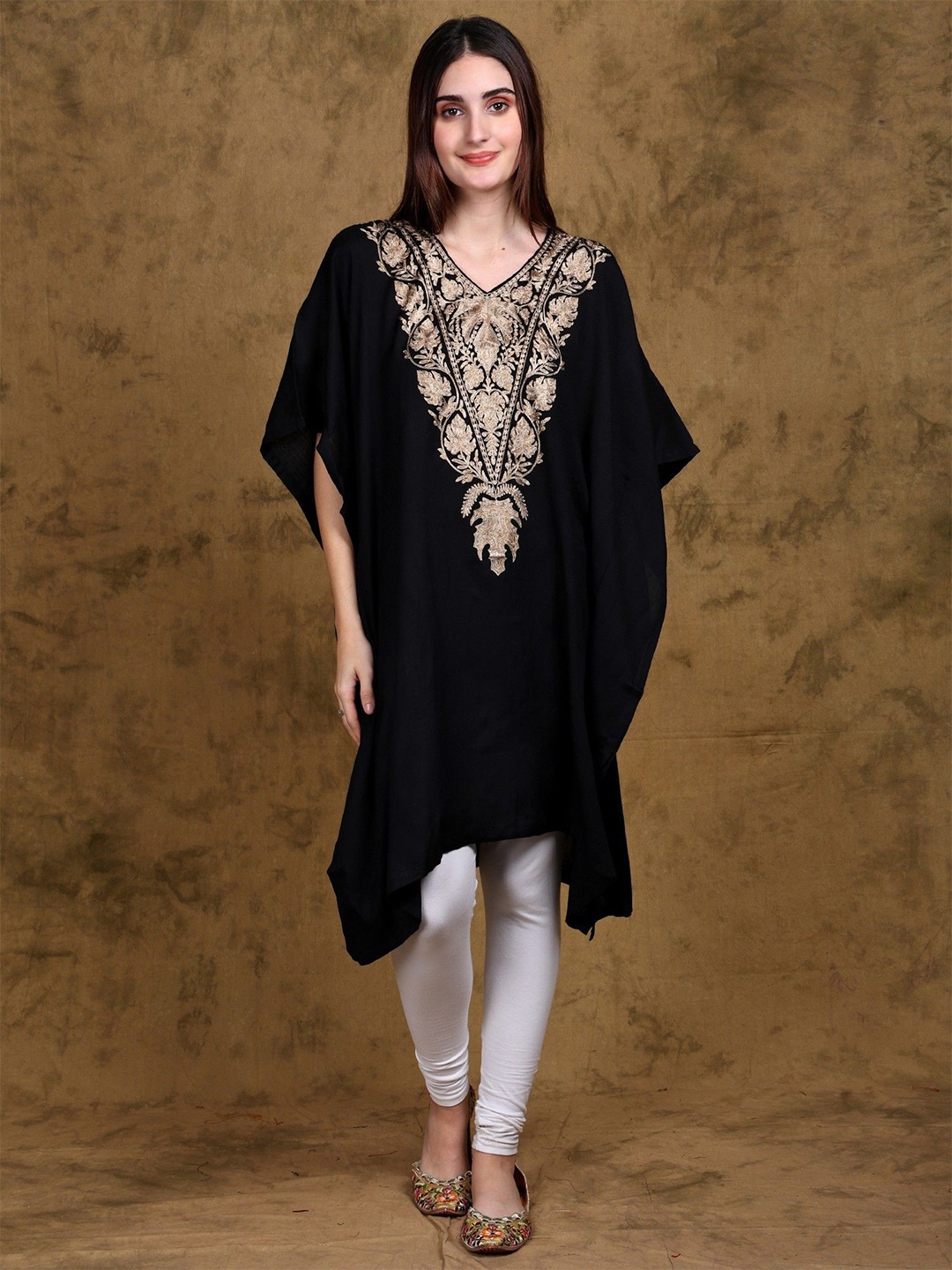 

Exotic India Black-Beauty Pure Wool Kashmiri Short Kaftan with Tilla Embroidery