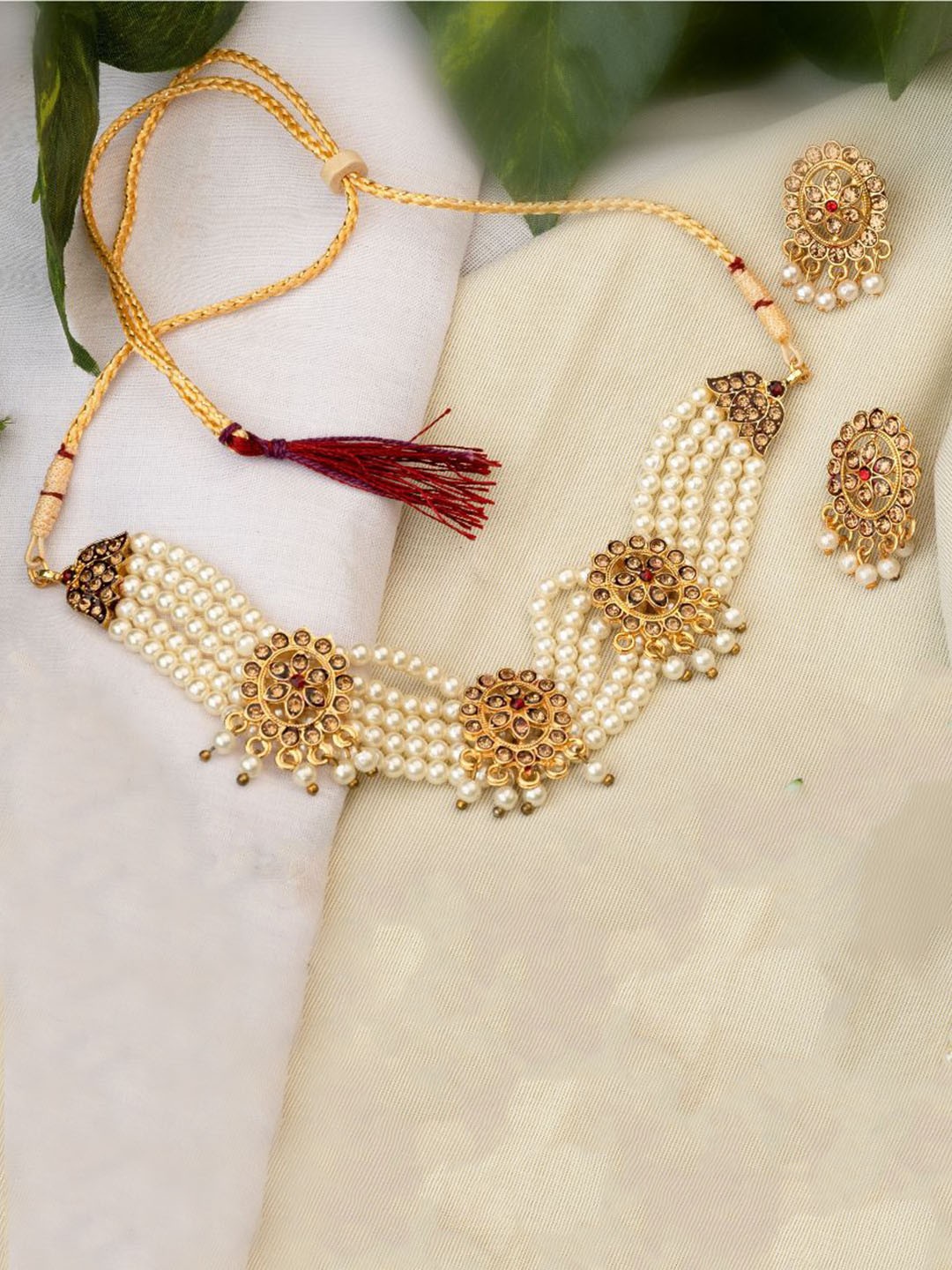 

TONOLIKA Gold-Plated Stone-Studded & Beaded Jewellery Set