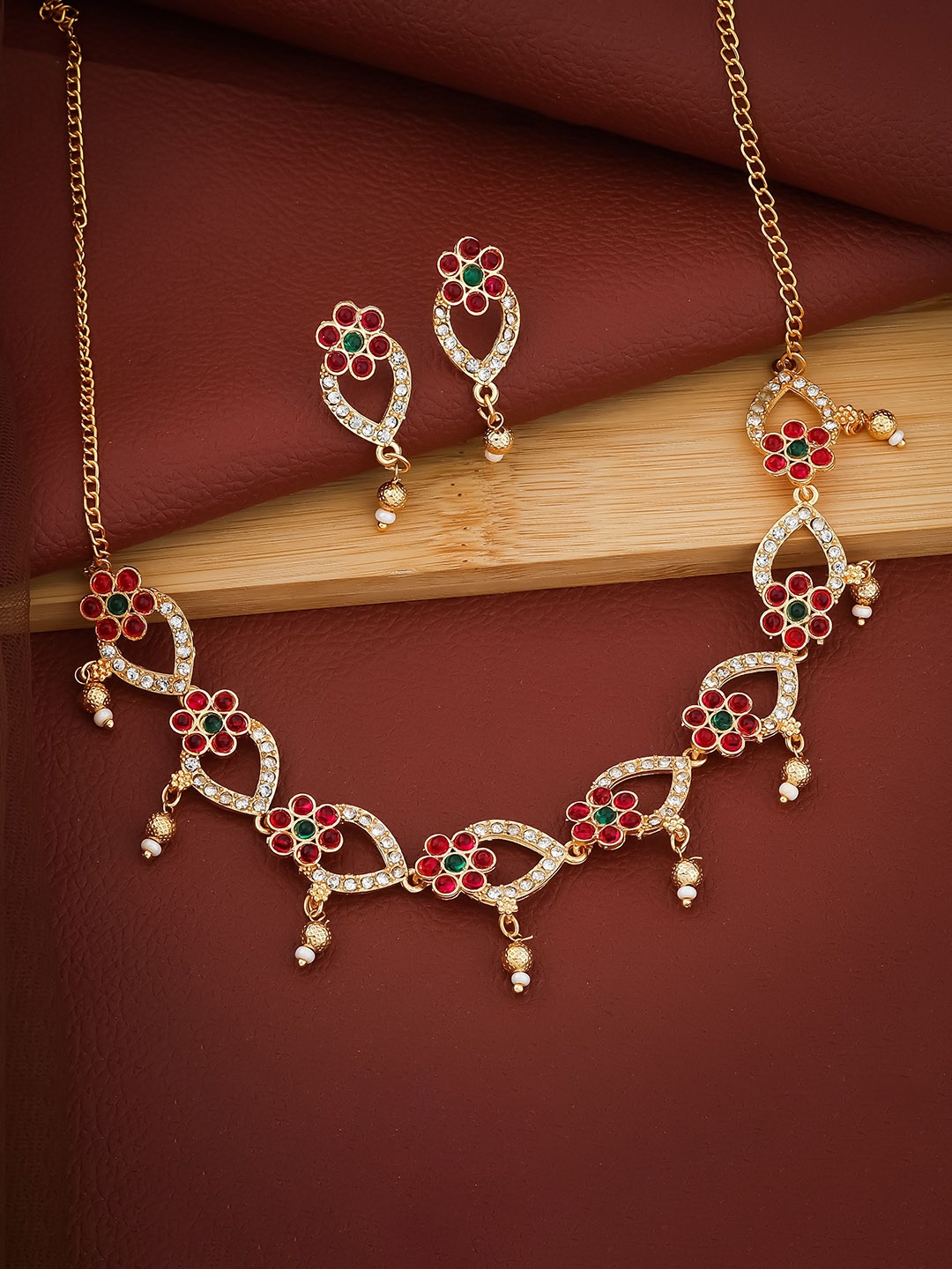 

TONOLIKA Gold-Plated Artificial Stone-Studded & Beaded Jewellery Set