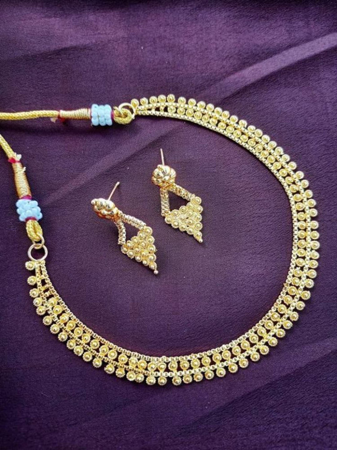 

TONOLIKA Gold Plated Textured Jewellery Set