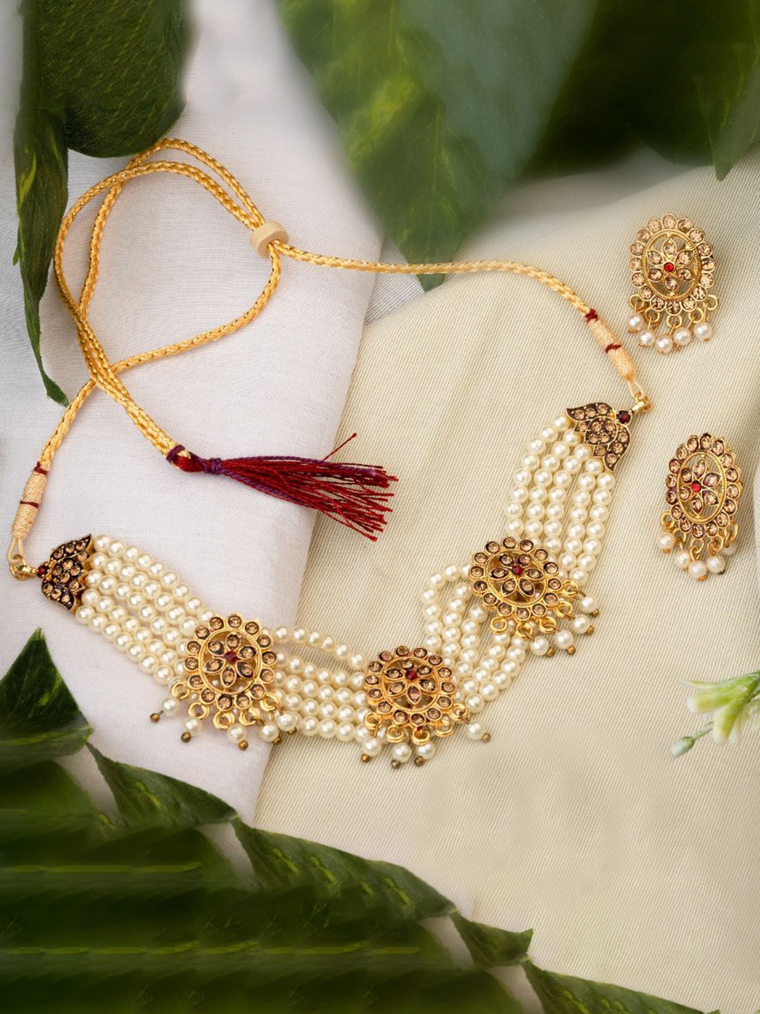 

TONOLIKA Gold-Plated Stone-Studded & Beaded Jewellery Set