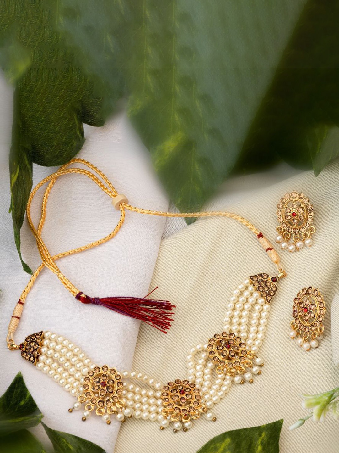 

TONOLIKA Gold-Plated Stone-Studded & Beaded Jewellery Set