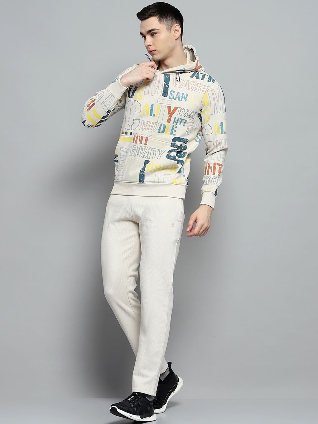 

Monte Carlo Men Printed Hooded Neck Full Sleeve Tracksuits, Beige