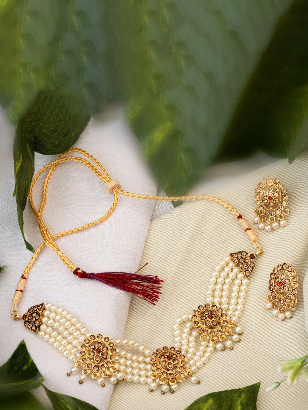 

TONOLIKA Gold-Plated Artificial Stone-Studded & Beaded Jewellery Set