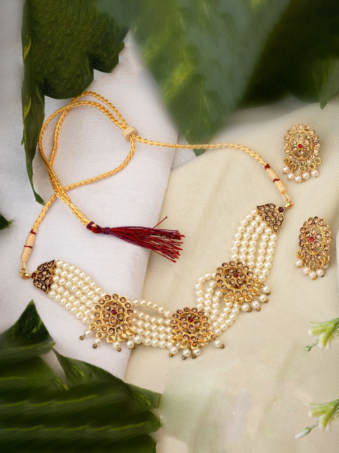 

TONOLIKA Gold-Plated Artificial Stone-Studded & Beaded Jewellery Set