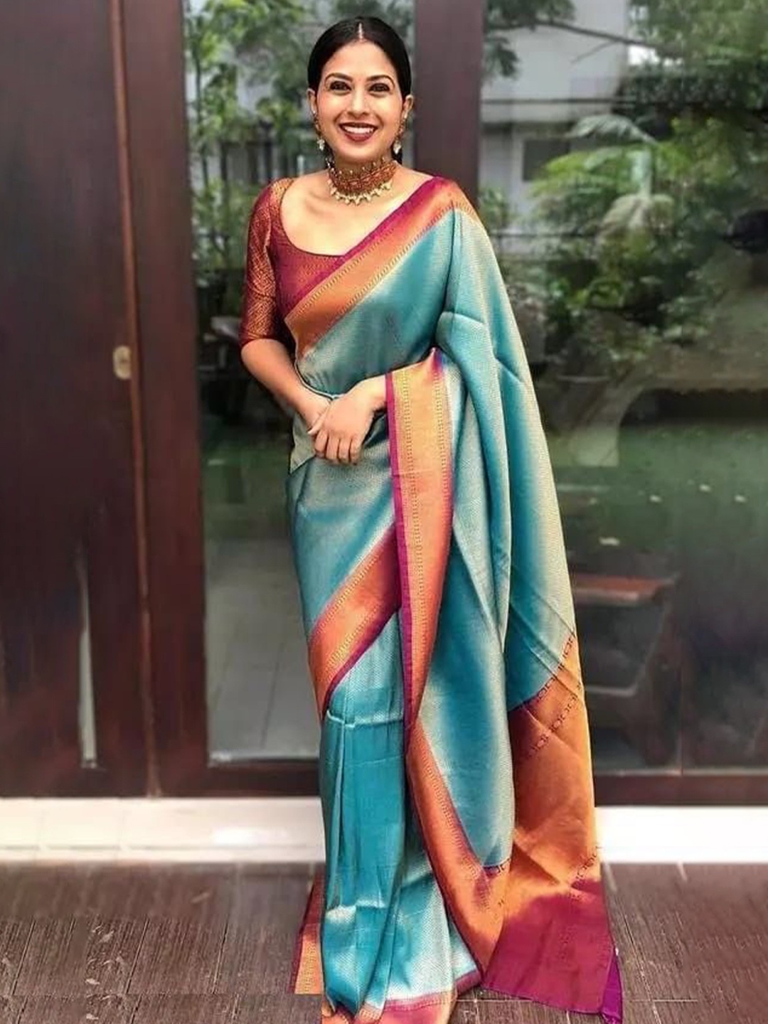 

KALINI Woven Design Zari Silk Blend Banarasi Saree, Blue