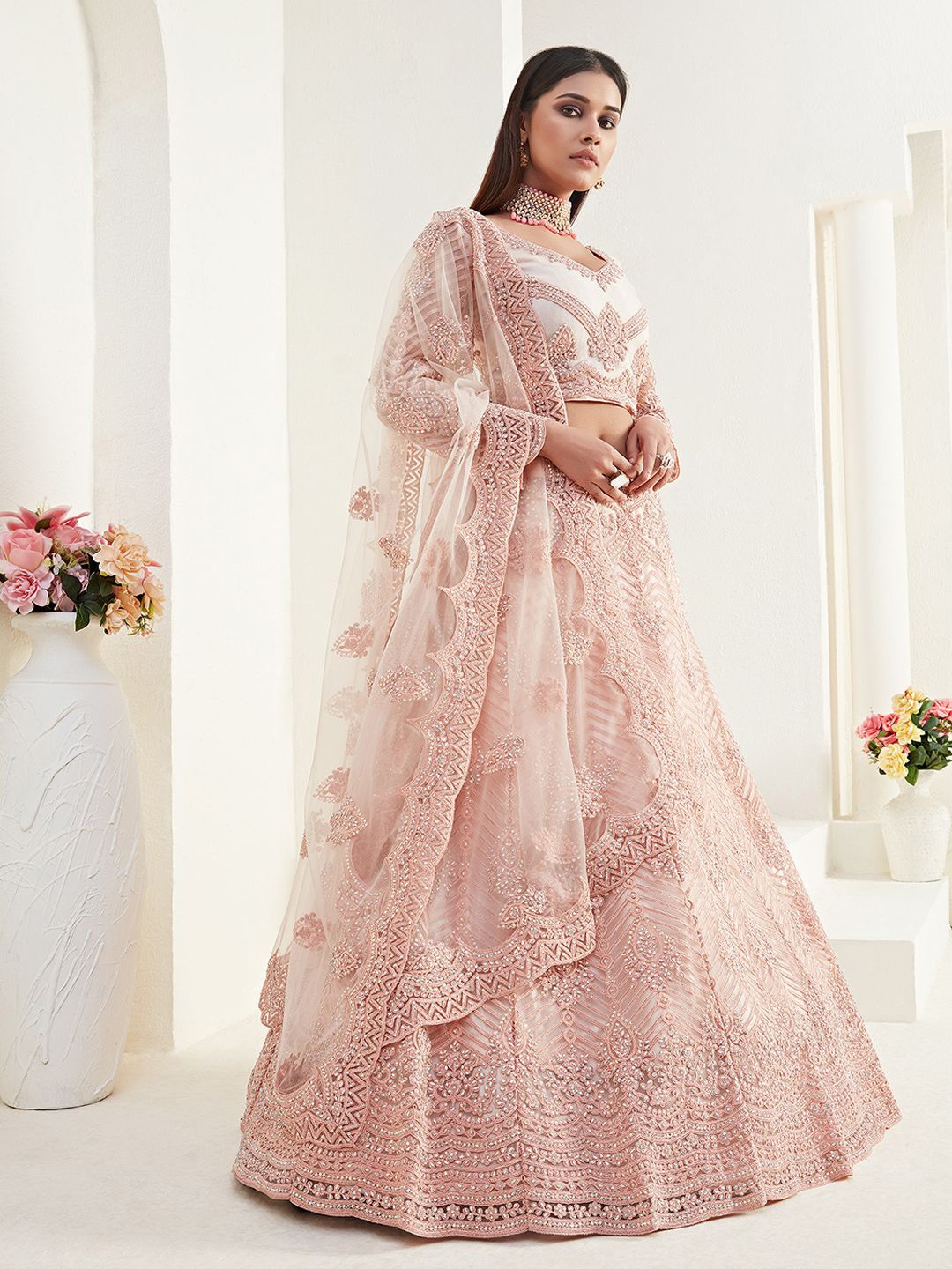 

ALIZEH Peach Embroidered Net Lehenga Choli With Dupatta