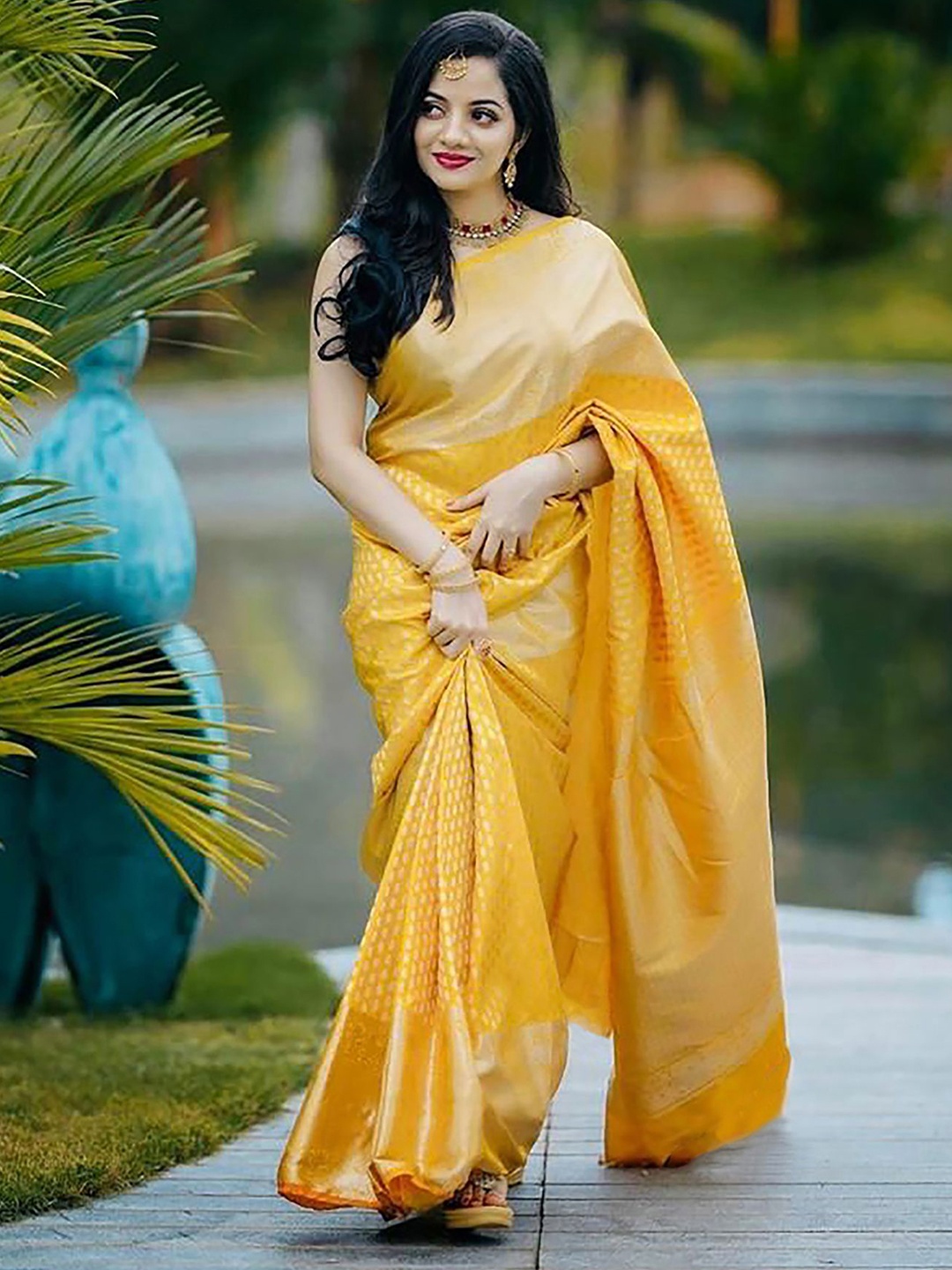 

Anjaneya Sarees Woven Design Zari Silk Blend Banarasi Saree, Yellow