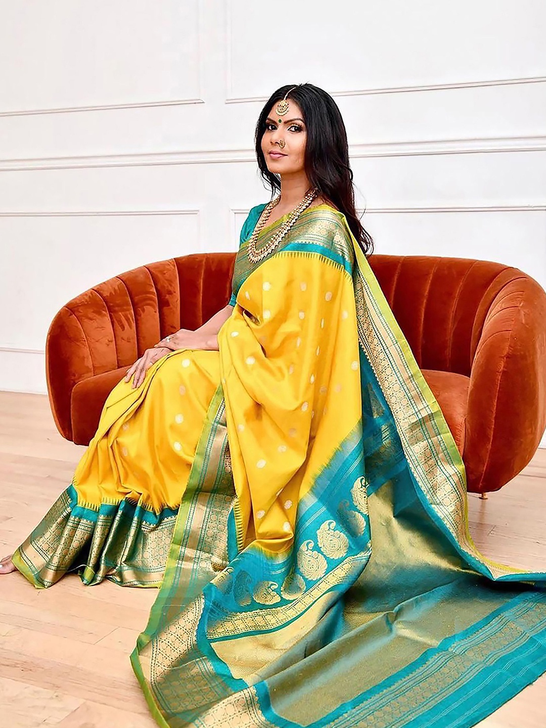 

Anjaneya Sarees Woven Design Zari Silk Blend Banarasi Saree, Yellow