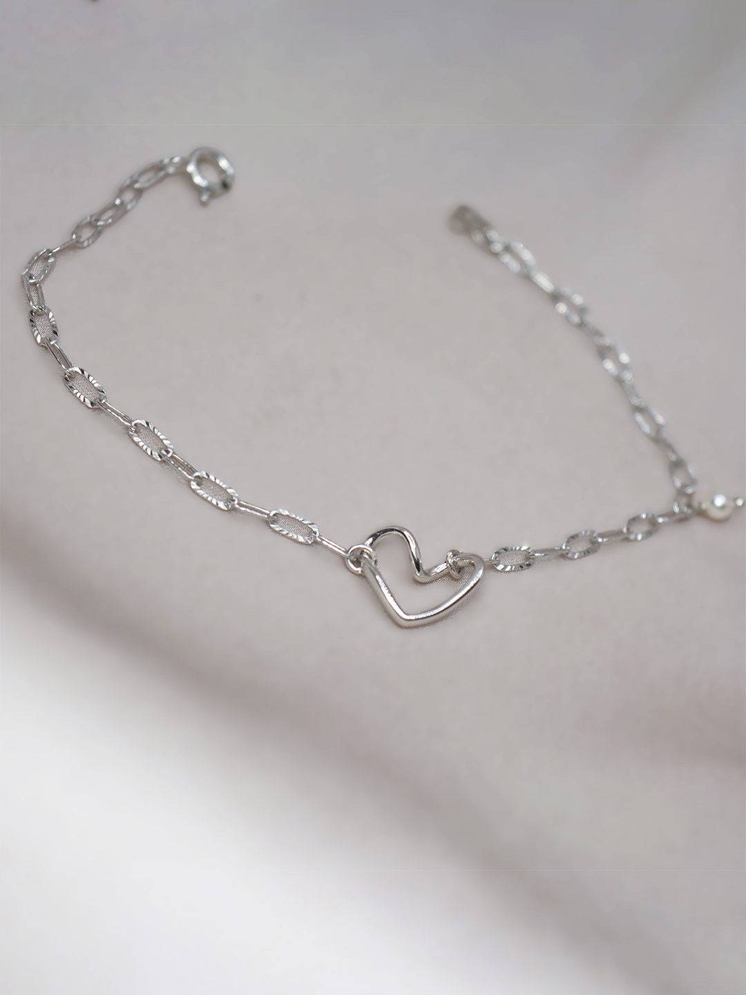 

Luxevogue Women Sterling Silver Cubic Zirconia Rhodium-Plated Link Bracelet