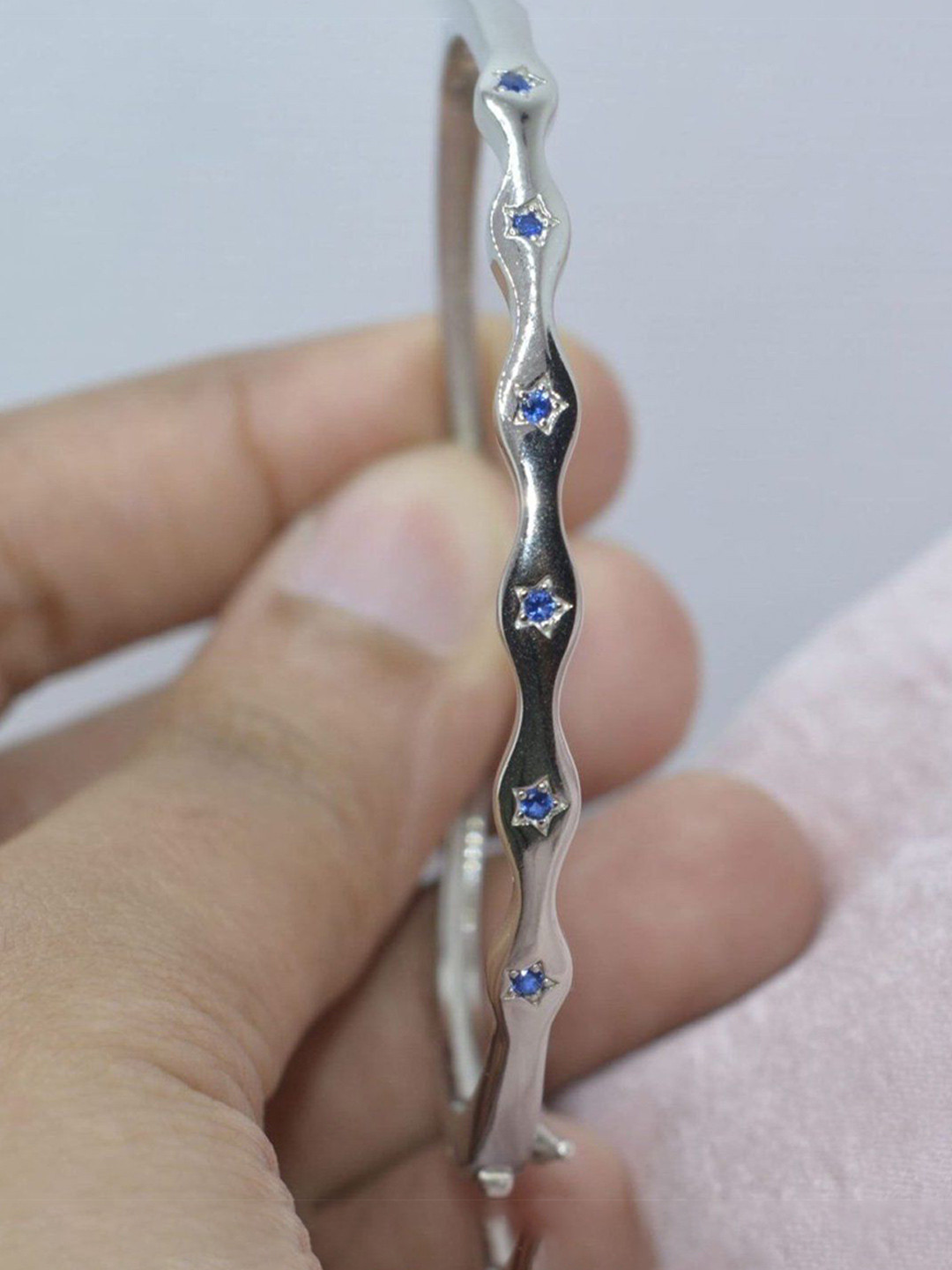 

Luxevogue Women Sterling Silver Cubic Zirconia Rhodium-Plated Bangle-Style Bracelet