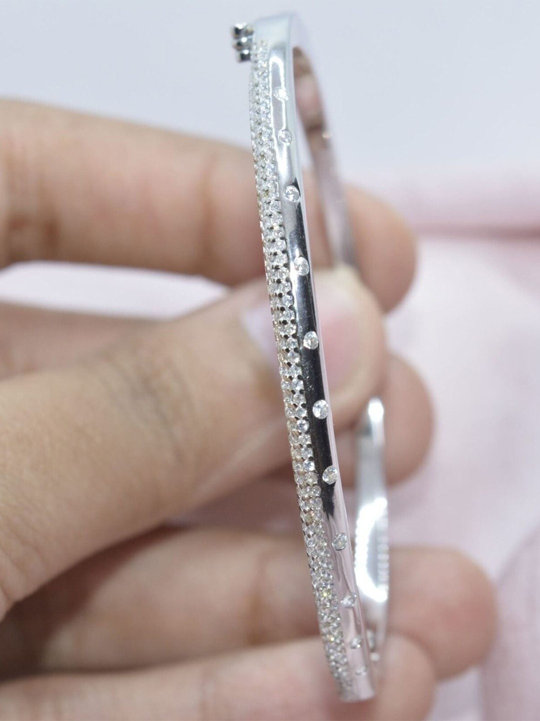 

Luxevogue Women Sterling Silver Cubic Zirconia Rhodium-Plated Bangle-Style Bracelet