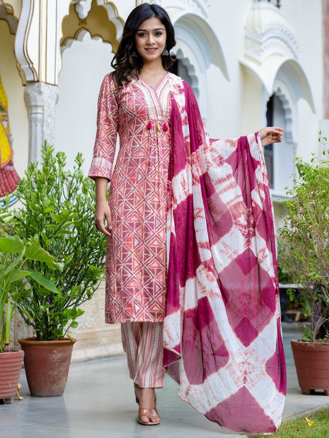 

KALINI Women Printed Regular Sequinned Kurta with Trousers & With Dupatta, Peach